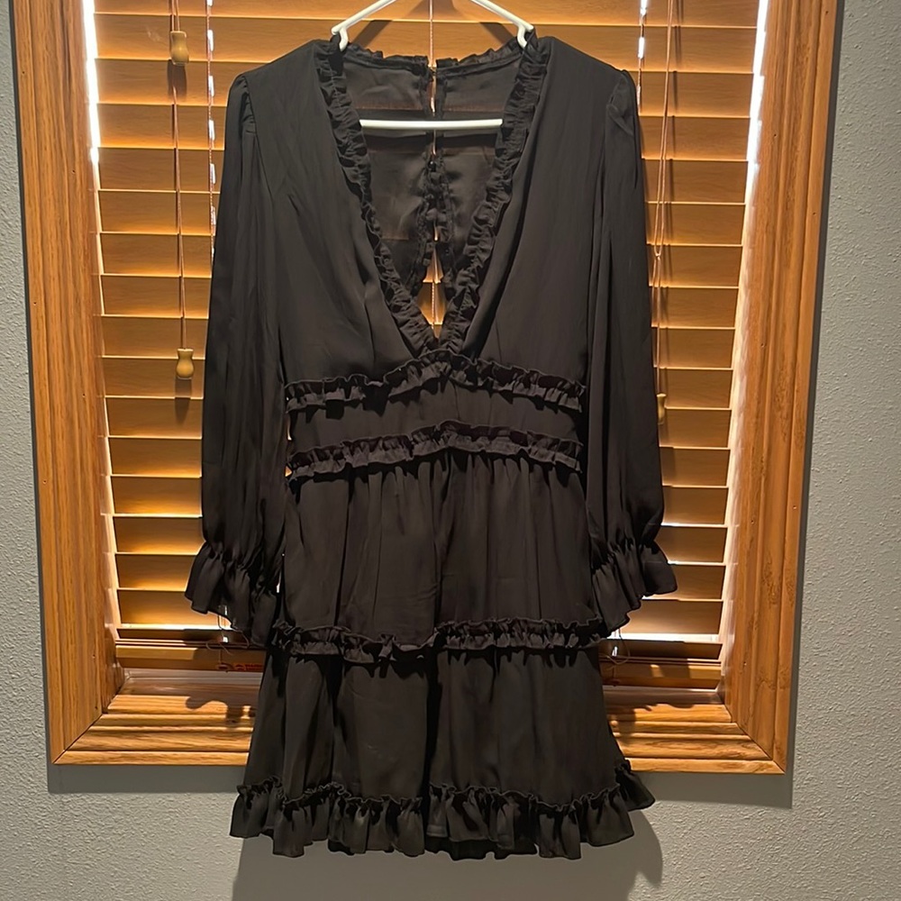 Long sleeve open back black dress